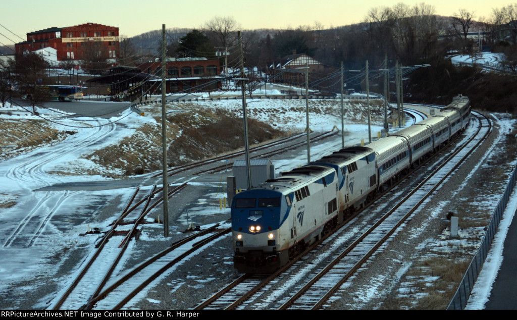 Amtrak #20(21) finally leaves Lynchburg.  A Greater Lynchburg Transit bus leaves its station, too,